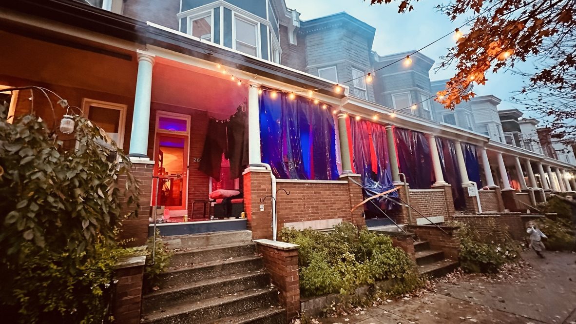 Porch row with lit fabric panels