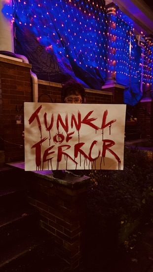 The sign under blue net lights