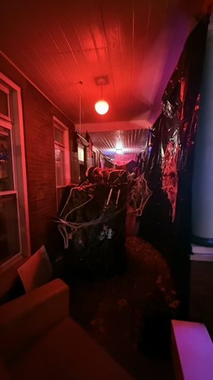 Red corridor with cobwebs