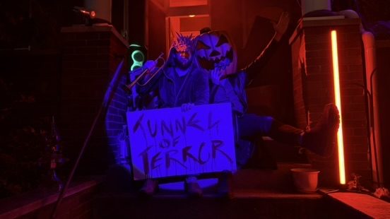 Sign, monsters, red light bar